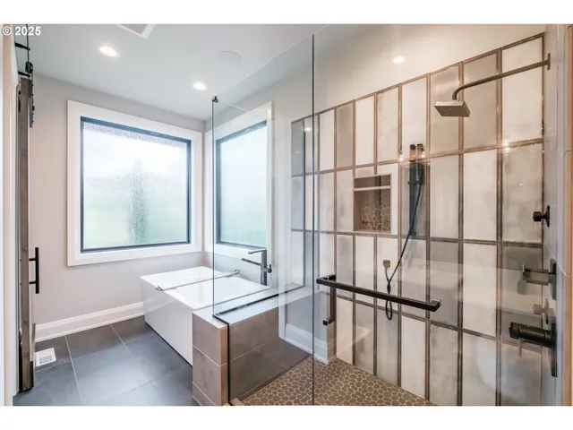 a living room with lots of furniture and a window