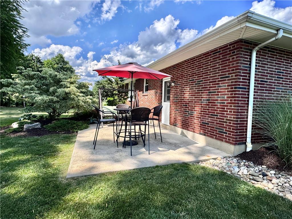5334 Egypt Road Laurys Station, PA 18059 - Photo 50 of 55 An inviting concrete patio provides a comfortable outdoor gathering space, perfect for entertaining.