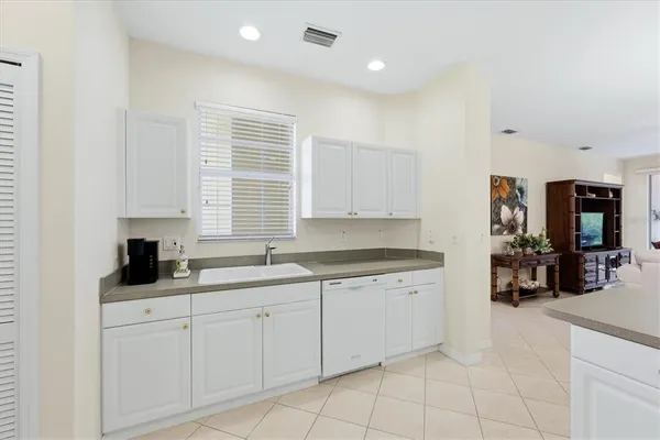 a bathroom with a sink double vanity and a mirror