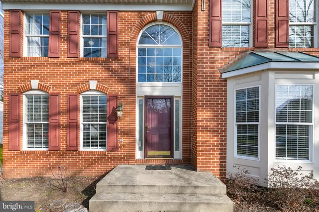 a front view of a house having yard