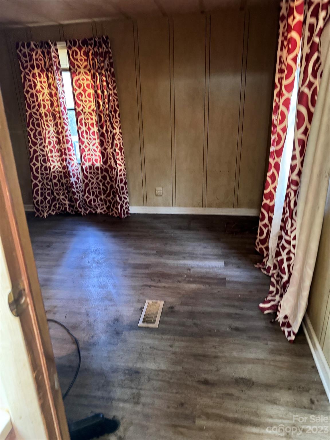 2121 Milton Road Durham, NC 27712 - Photo 5 of 14 a view of an entryway with wooden floor