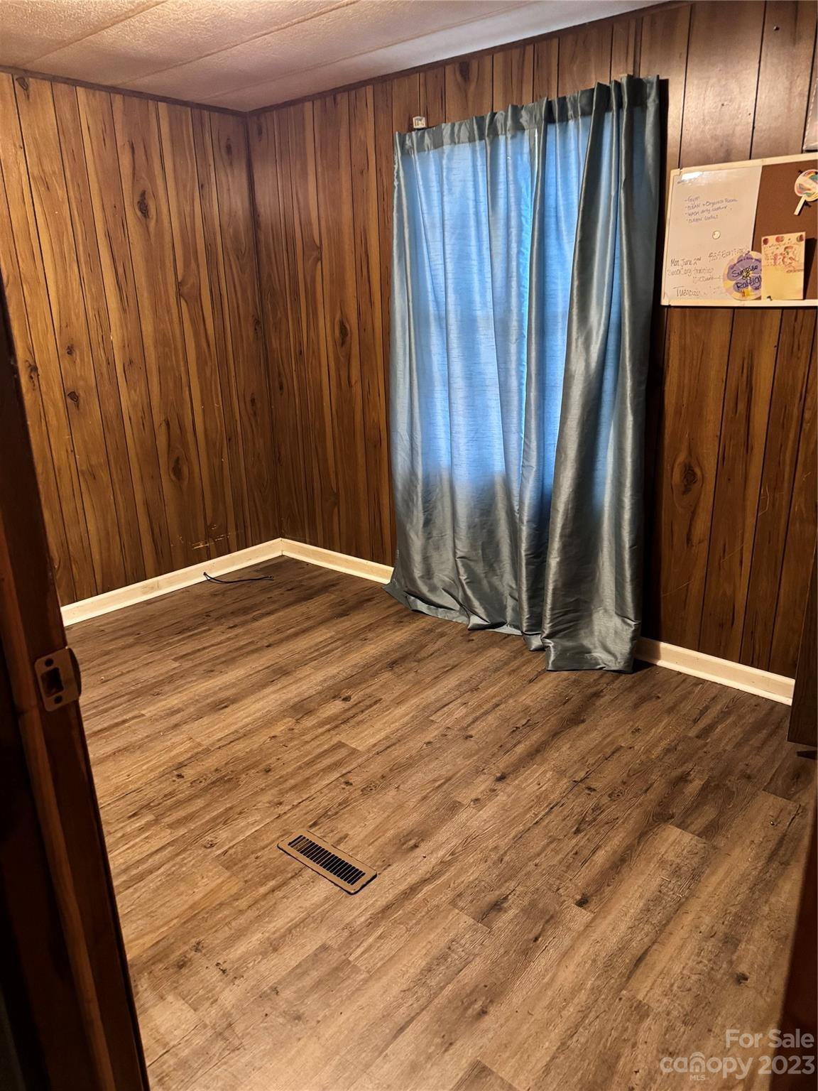 2121 Milton Road Durham, NC 27712 - Photo 9 of 14 a view of a room with wooden walls
