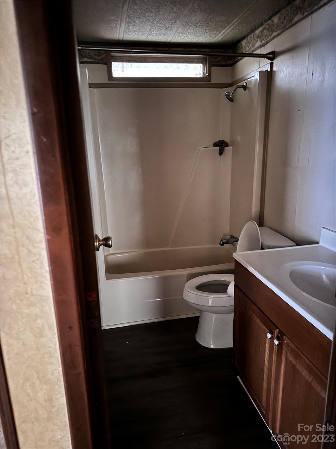 2121 Milton Road Durham, NC 27712 - Photo 10 of 14 a bathroom with a granite countertop sink toilet and shower