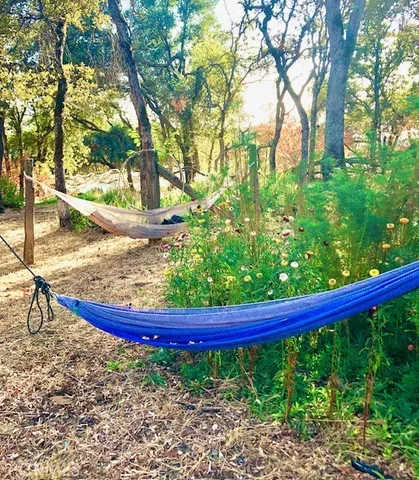 a view of a backyard of the house