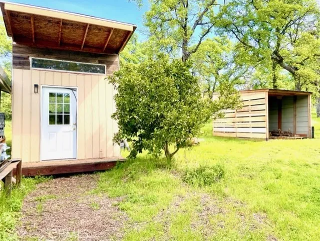 a backyard of a house with lots of green space