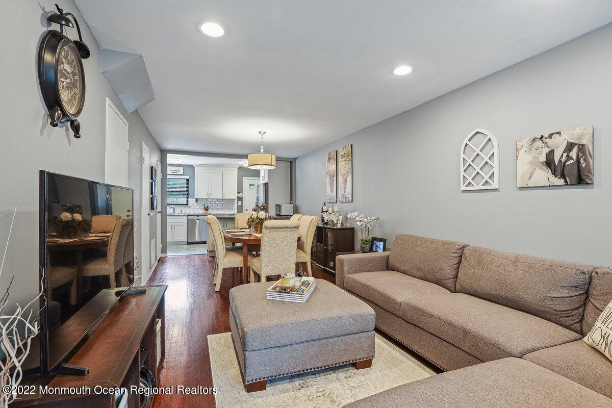321 Spring Street, Unit 11 Red Bank, NJ 07701 - Photo 16 of 29 a living room with furniture