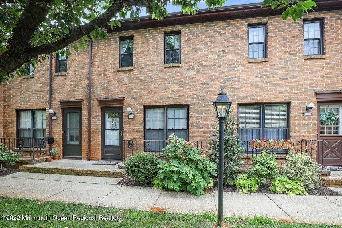 321 Spring Street, Unit 11 Red Bank, NJ 07701 - Photo 5 of 29 a view of brick house with a large windows