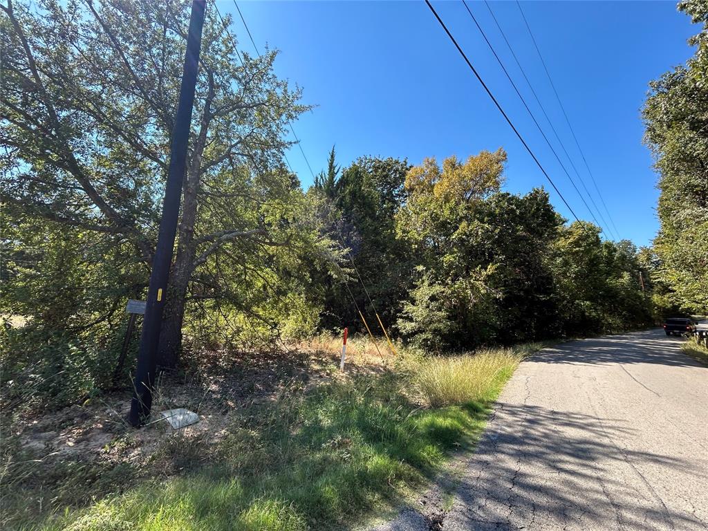 148 Midway Road Tool, TX 75143 - Photo 3 of 8 a view of backyard of house