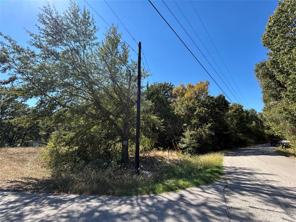 148 Midway Road Tool, TX 75143 - Photo 5 of 8 a view of a yard