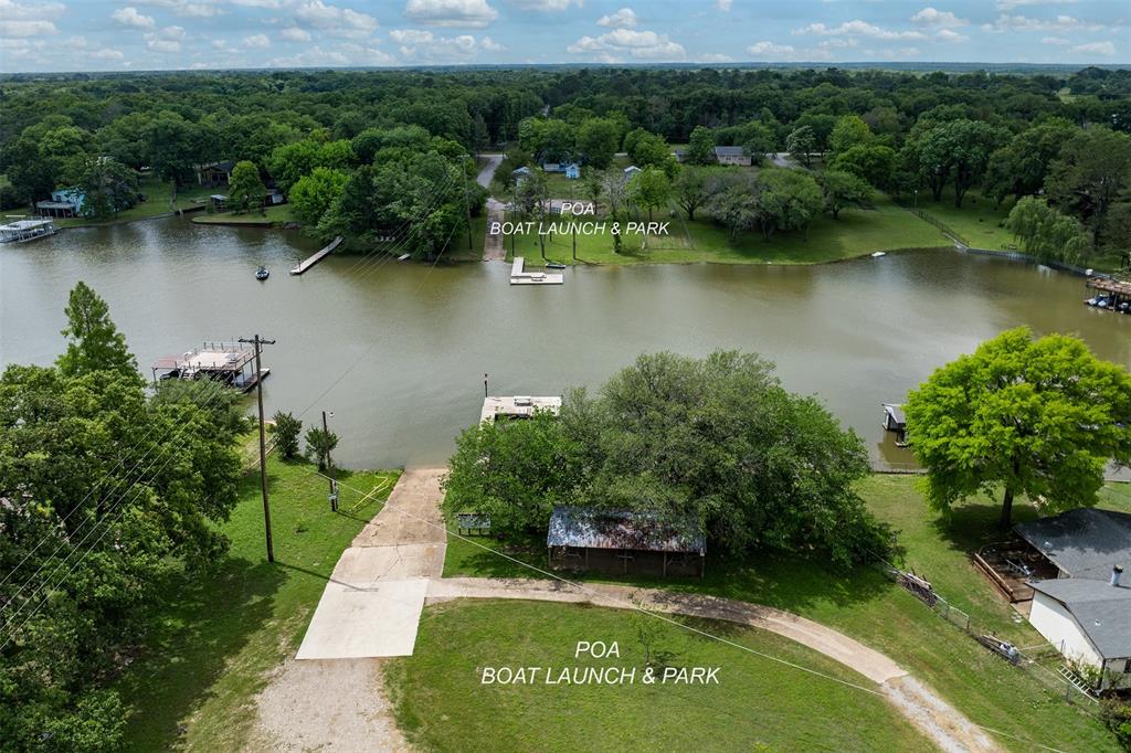 148 Midway Road Tool, TX 75143 - Photo 6 of 8 an aerial view of a house with a yard and a garden