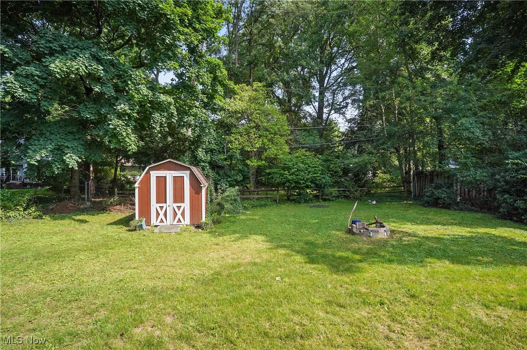 2829 Lee Road Silver Lake, OH 44224 - Photo 22 of 30 View of yard with a storage unit
