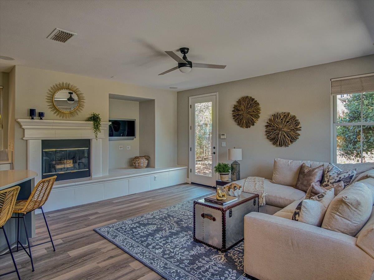 1042 Promenade Street Hercules, CA 94547 - Photo 12 of 60 a living room with furniture and a fireplace