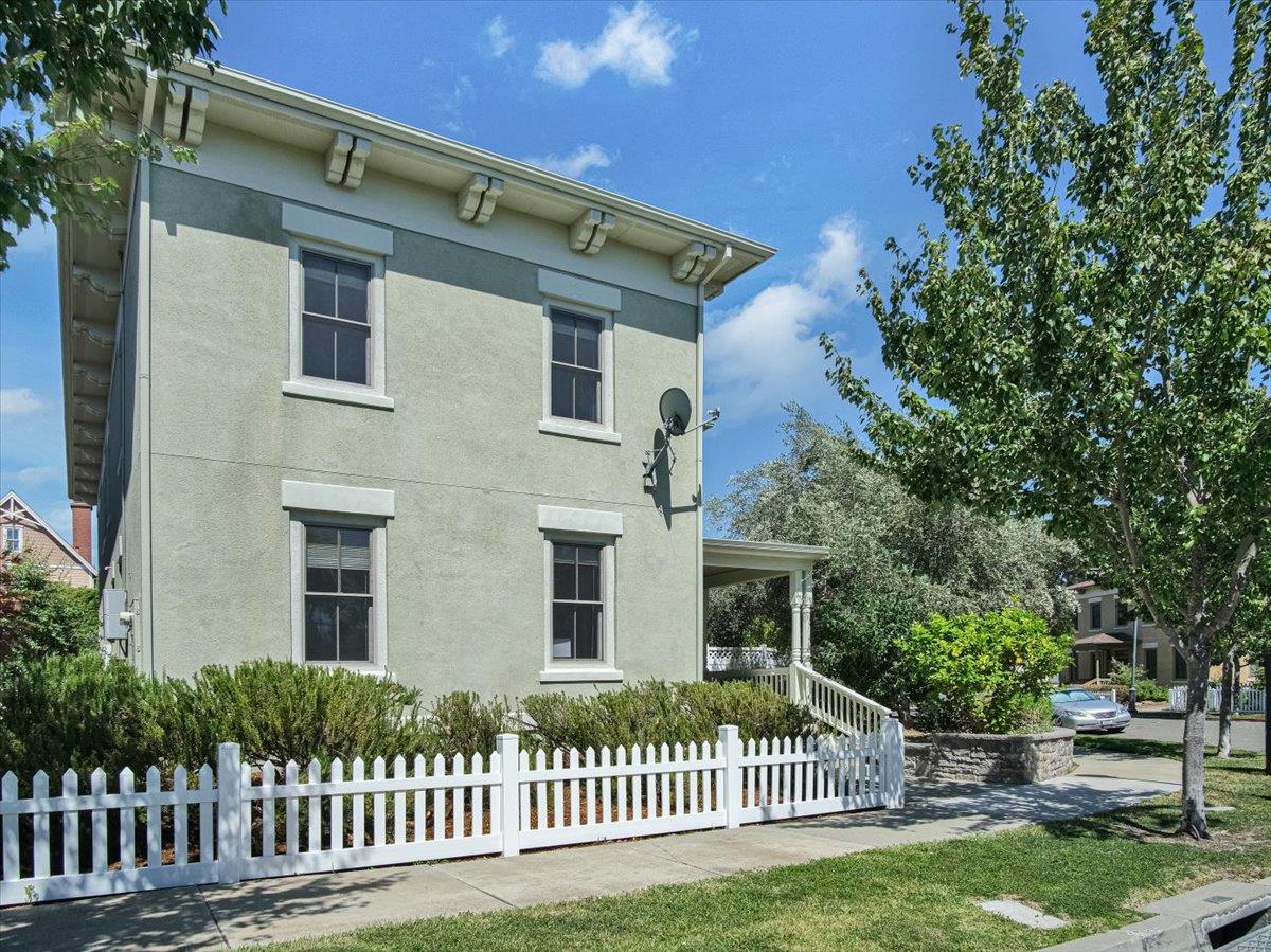 1042 Promenade Street Hercules, CA 94547 - Photo 3 of 60 a front view of a house with a garden