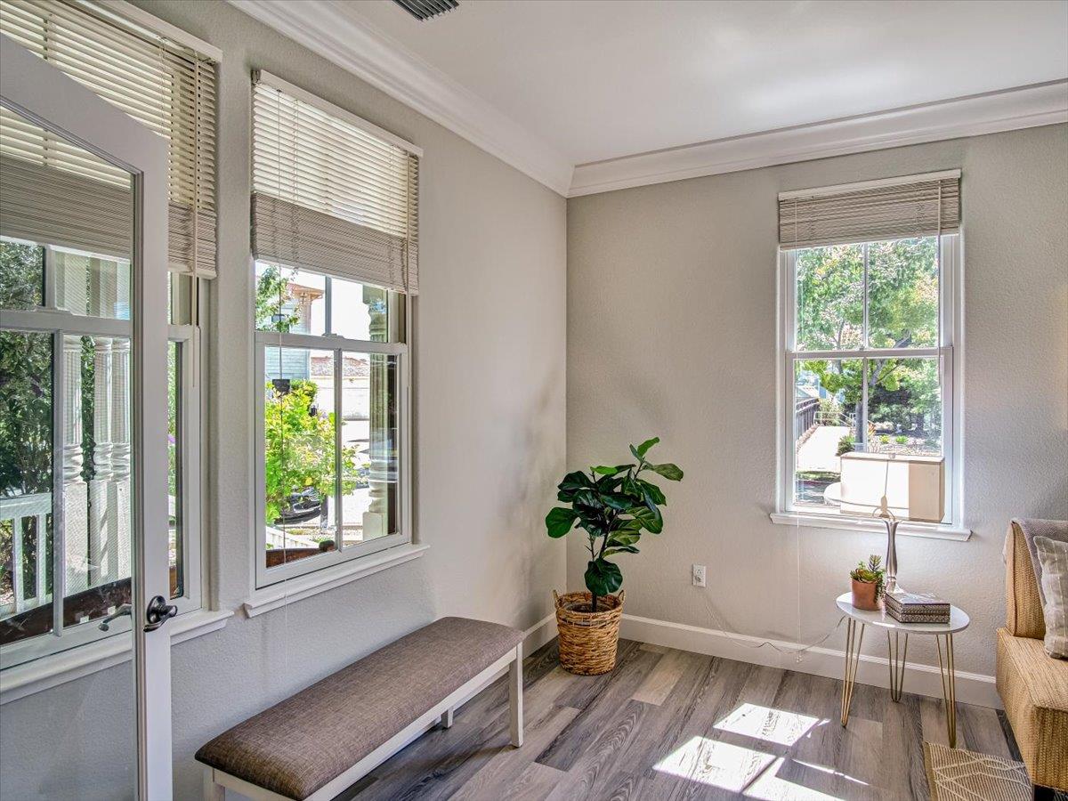 1042 Promenade Street Hercules, CA 94547 - Photo 36 of 60 a room with furniture and a potted plant