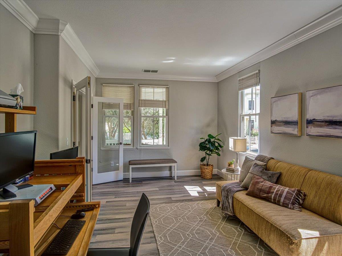 1042 Promenade Street Hercules, CA 94547 - Photo 39 of 60 a living room with furniture and a flat screen tv