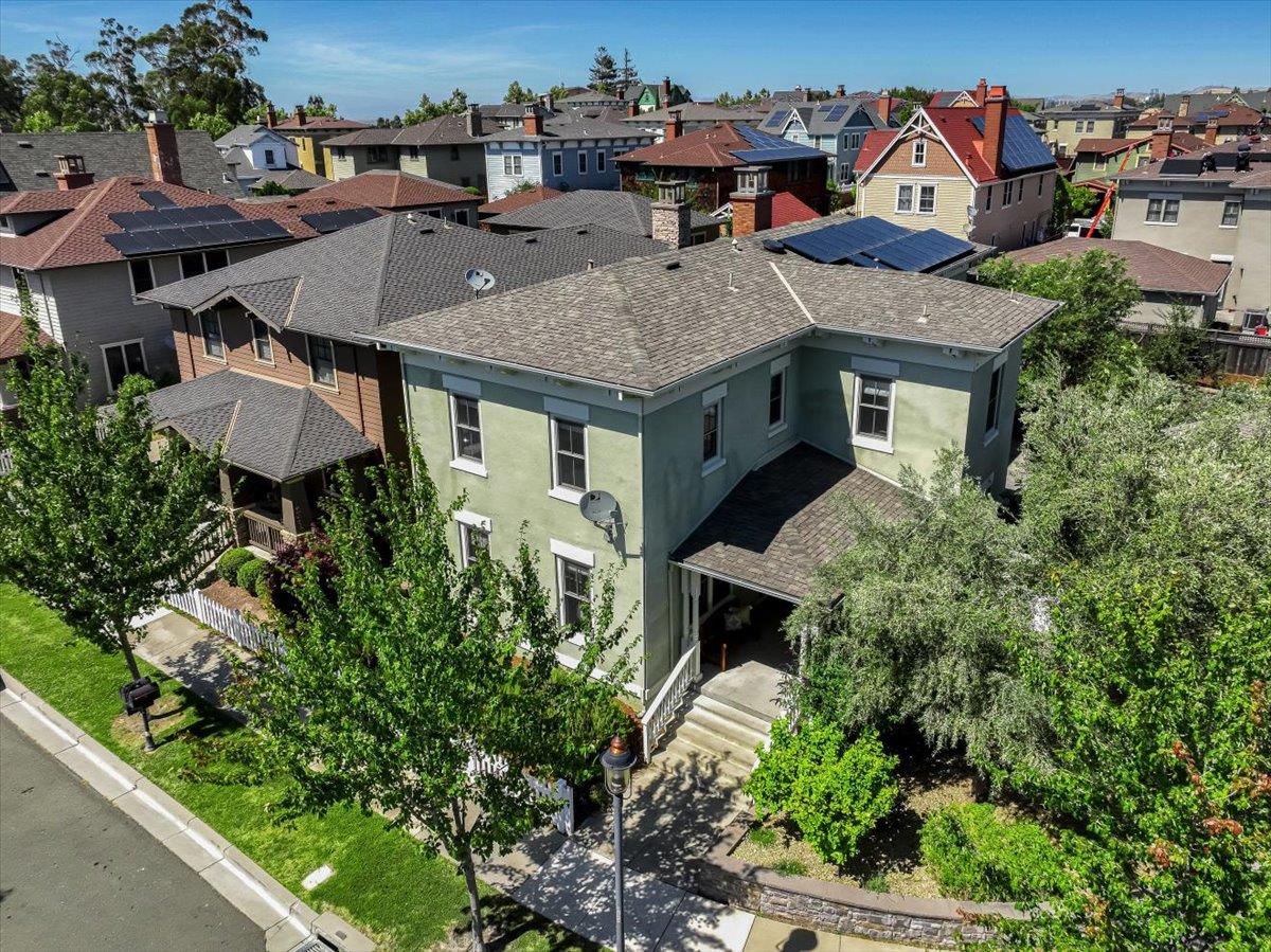 1042 Promenade Street Hercules, CA 94547 - Photo 51 of 60 an aerial view of a house with a yard and potted plants