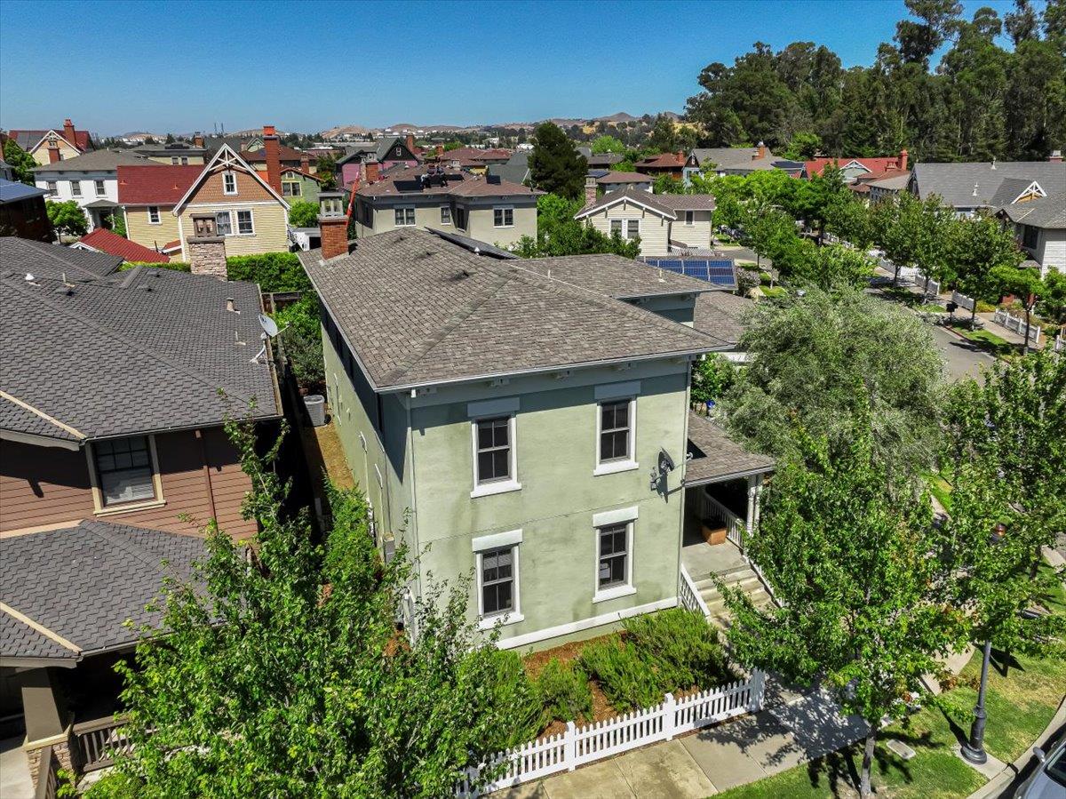 1042 Promenade Street Hercules, CA 94547 - Photo 52 of 60 an aerial view of a house with a yard and lake view