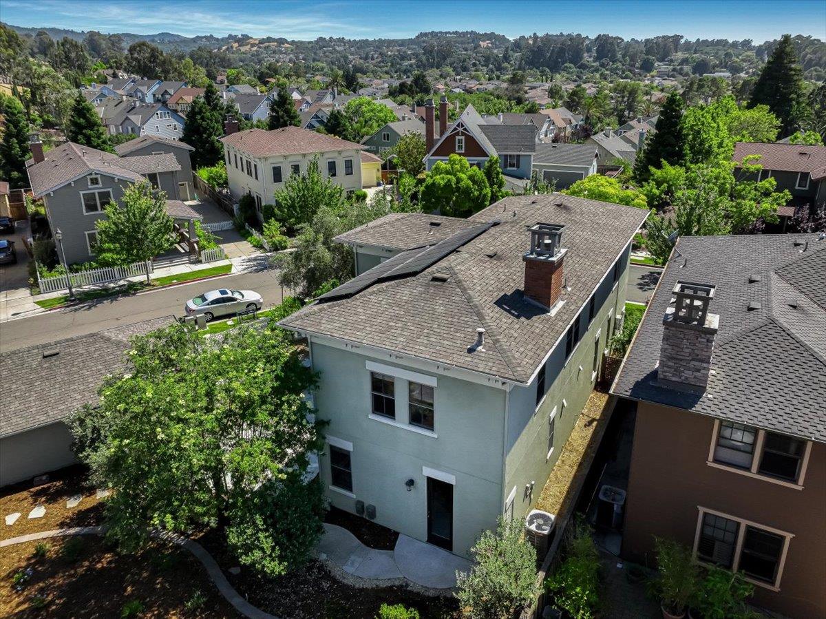 1042 Promenade Street Hercules, CA 94547 - Photo 54 of 60 an aerial view of multiple houses with a yard