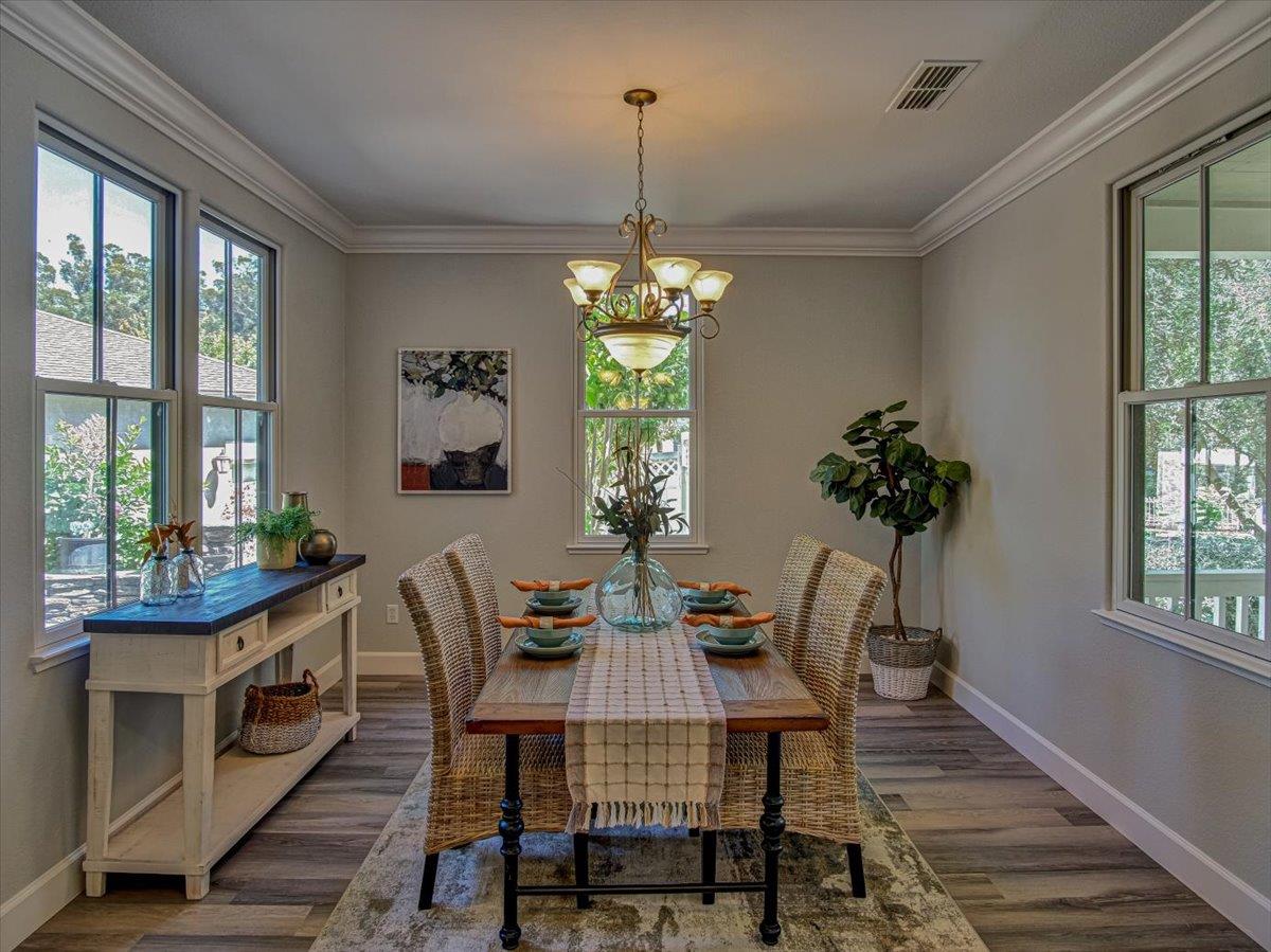 1042 Promenade Street Hercules, CA 94547 - Photo 7 of 60 a view of a dining room with furniture window and wooden floor