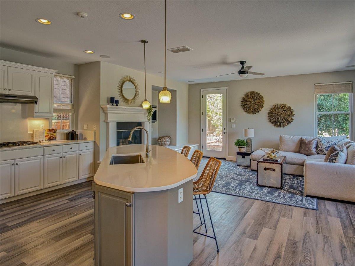 1042 Promenade Street Hercules, CA 94547 - Photo 8 of 60 a living room with furniture and a wooden floor