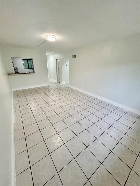2252 Northwest 183rd Street, Unit 4 Miami Gardens, FL 33056 - Photo 4 of 15 a view of a livingroom and entryway