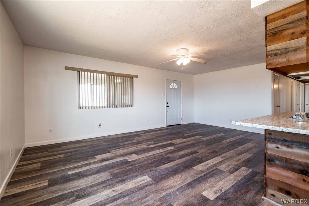3572 Verde Road Golden Valley, AZ 86413 - Photo 22 of 42 a view of empty room with window and ceiling fan