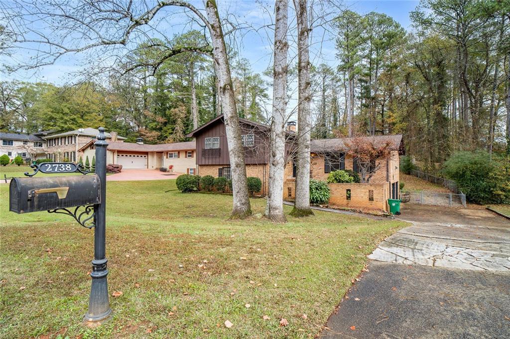 2738 Rainbow Ridge Road Decatur, GA 30034 - Photo 44 of 47 a house view with a sitting space