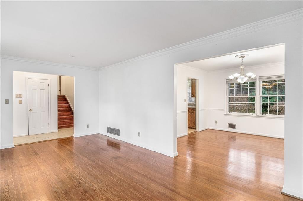 2738 Rainbow Ridge Road Decatur, GA 30034 - Photo 8 of 47 wooden floor in an empty room with a window