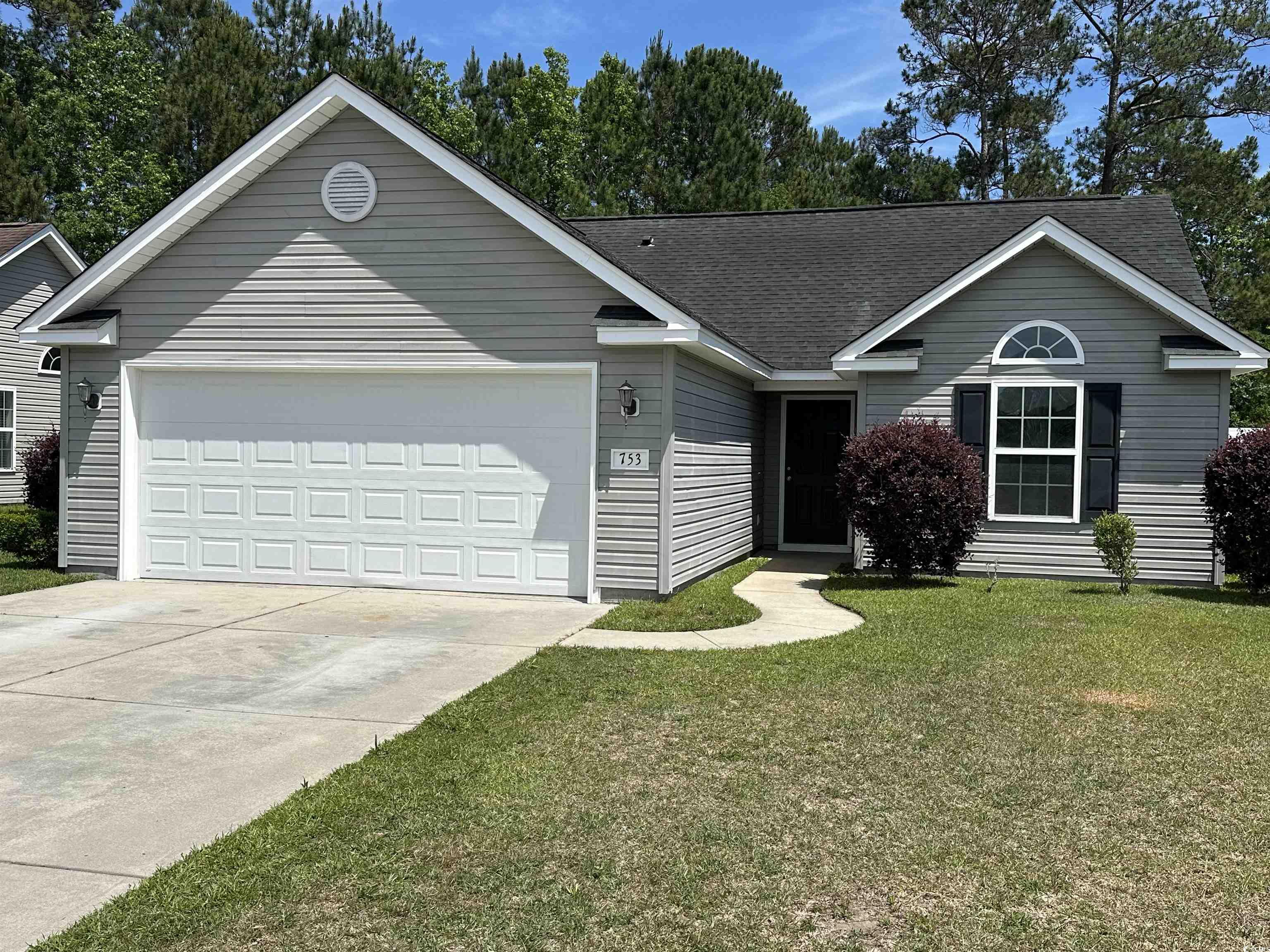 753 Bucklin Loop Myrtle Beach, SC 29579 - Photo 1 of 21 Single story home with an attached garage, drivewa
