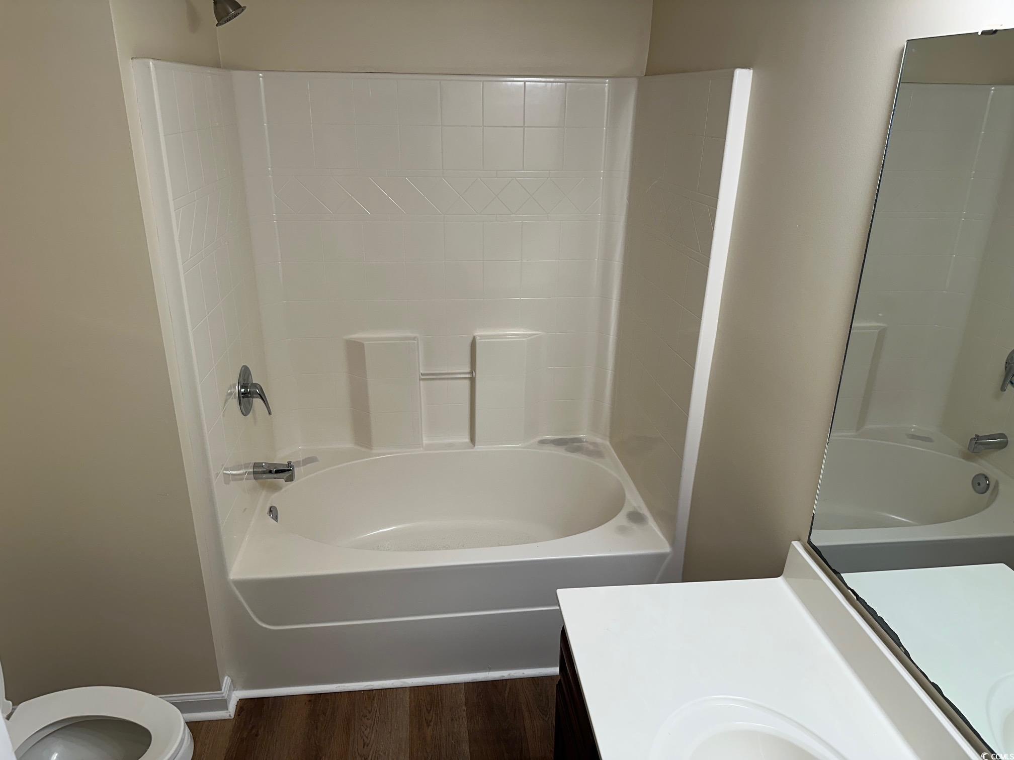 753 Bucklin Loop Myrtle Beach, SC 29579 - Photo 9 of 21 Full bath with toilet, vanity, wood finished floor