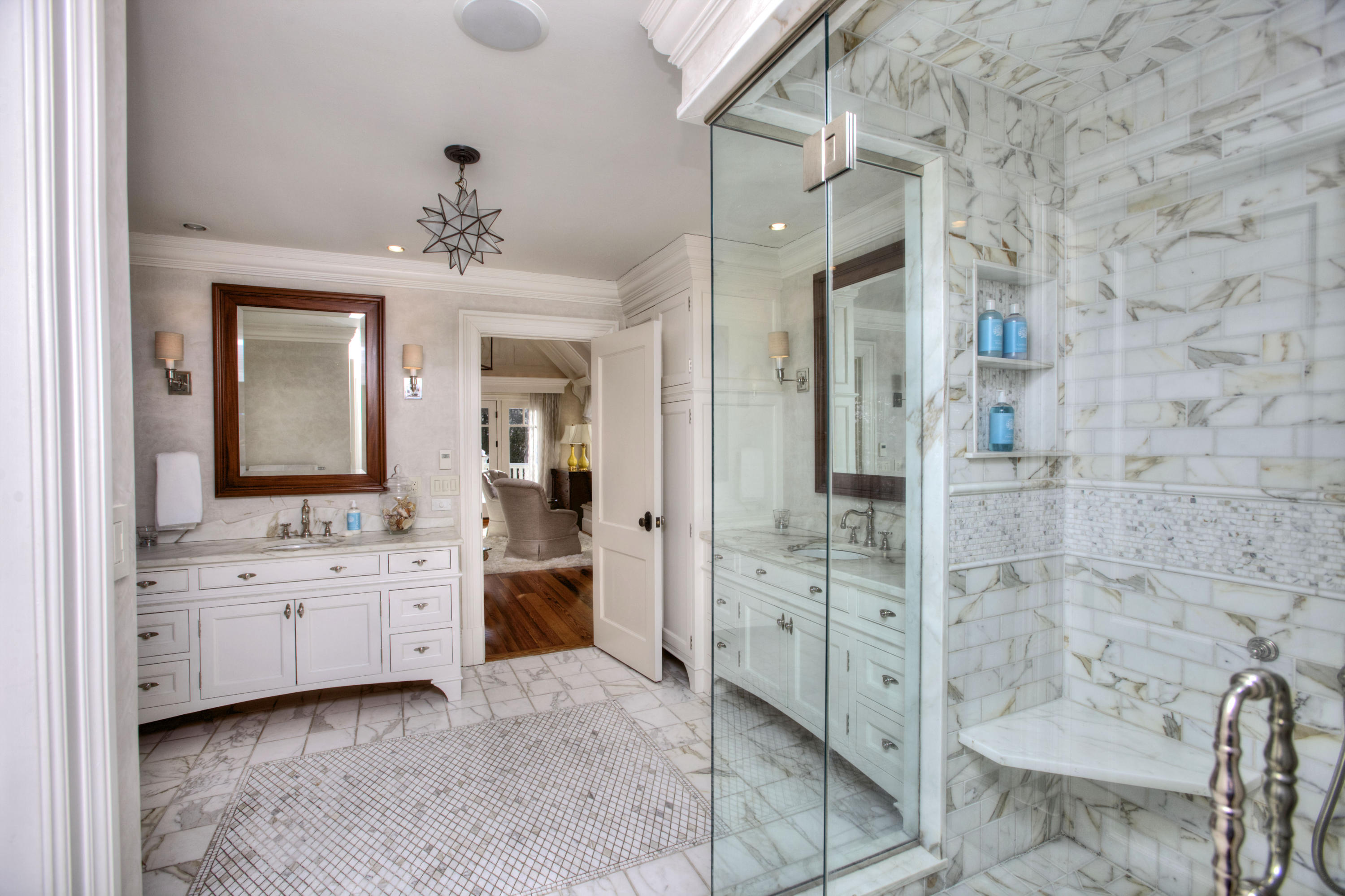 100 Goodwives River Road Darien, CT 06820 - Photo 20 of 25 a spacious bathroom with a double vanity sink a mirror and a shower