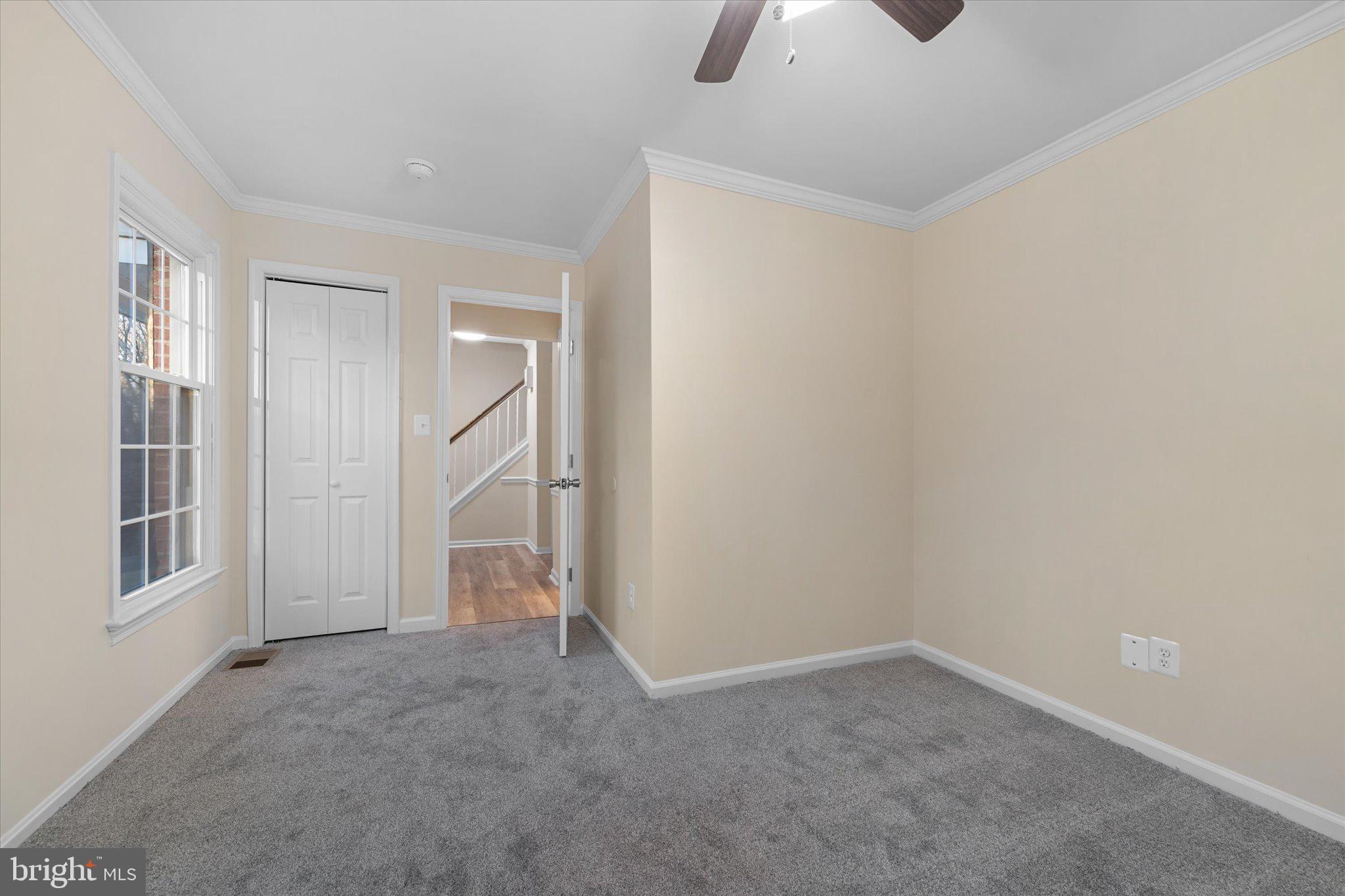 8016 Stillbrooke Road Manassas, VA 20112 - Photo 15 of 41 an empty room with a empty space and windows