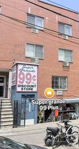 a view of a store with an outdoor space