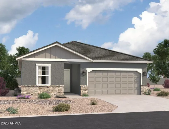 a front view of a house with garage