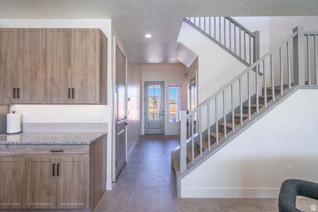 2972 West 570 North Hurricane, UT 84737 - Photo 58 of 104 Foyer entrance featuring stairs and recessed lighting
