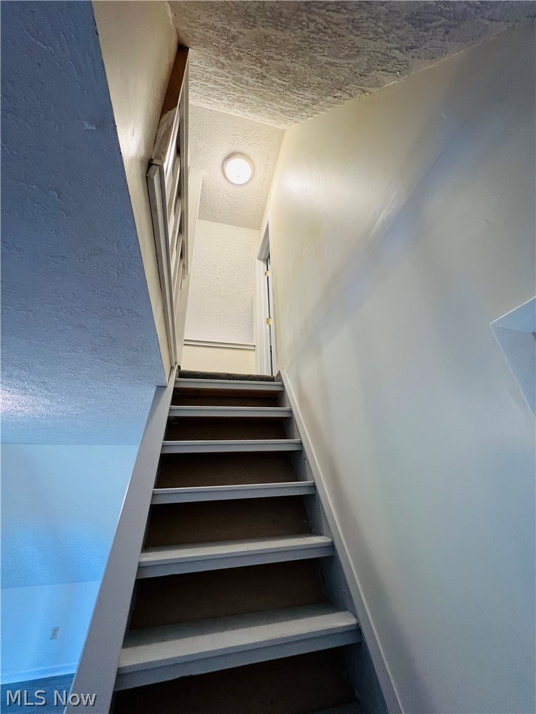 75305 Lake Ridge Road Piedmont, OH 43983 - Photo 14 of 25 Steps to bedrooms