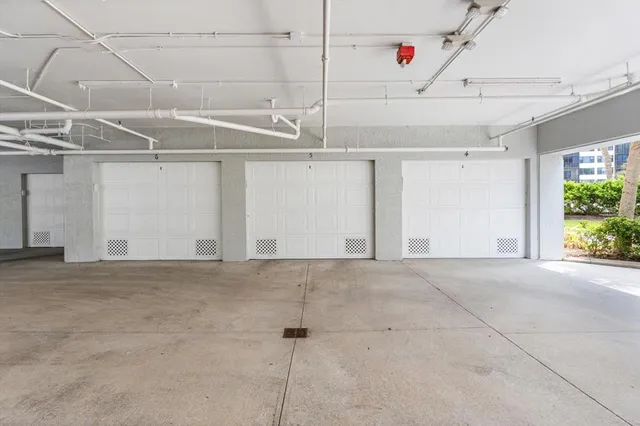 an aerial view of a city with lake view