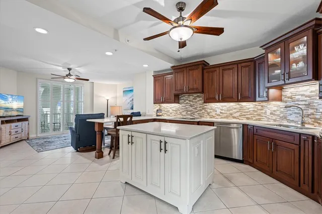 a kitchen with a cabinets stainless steel appliances and a counter top space