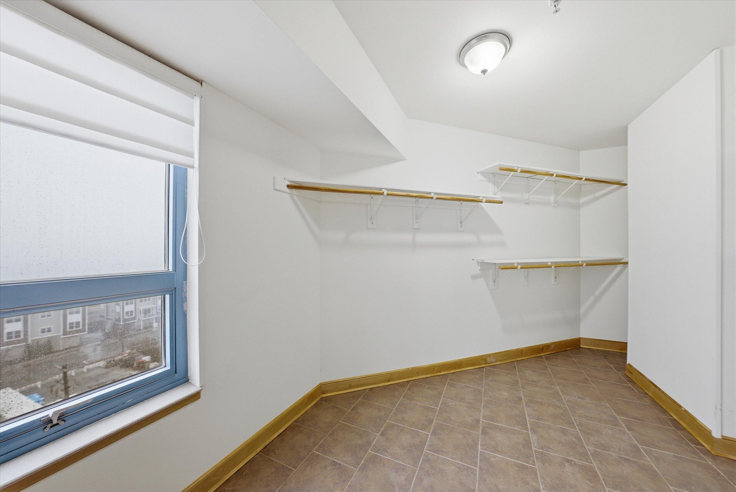 415 Lake Street, Unit 701 Port Washington, WI 53074 - Photo 21 of 31 Primary walk in closet