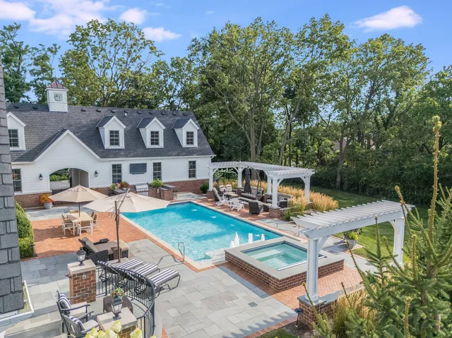 a view of balcony with outdoor seating and a potted plant