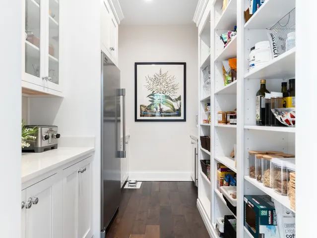 a bathroom with a sink a mirror and shower