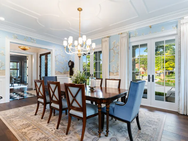 a bathroom with a granite countertop sink toilet a mirror and shower