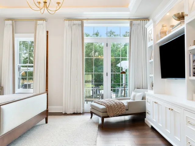 a room with furniture and a flat screen tv