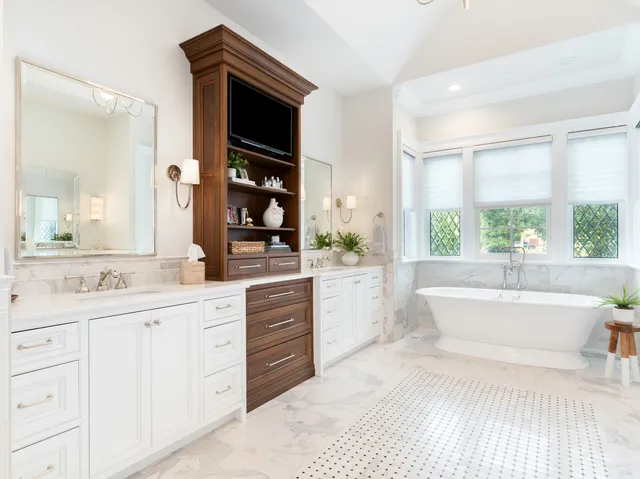 a kitchen with stainless steel appliances granite countertop a stove and a refrigerator