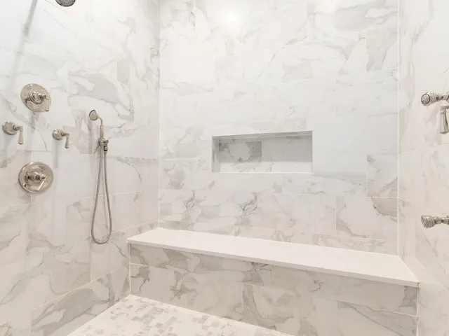 a livingroom with furniture and a flat screen tv