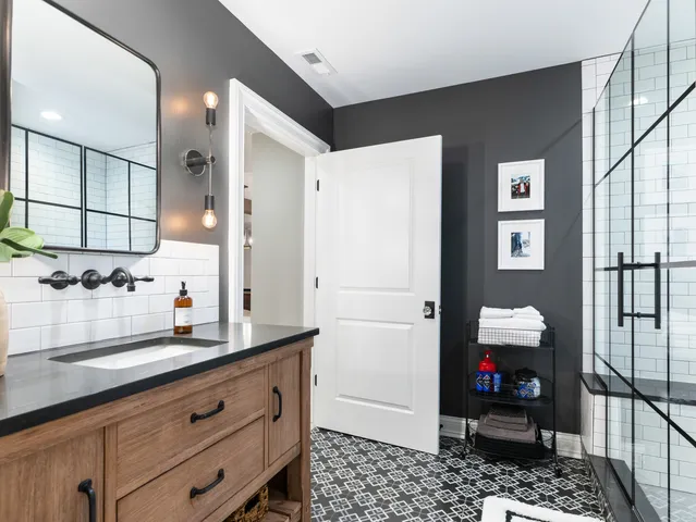 a view of a garage with cars and a garage