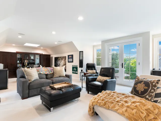 a view of a garage with cars and other equipment