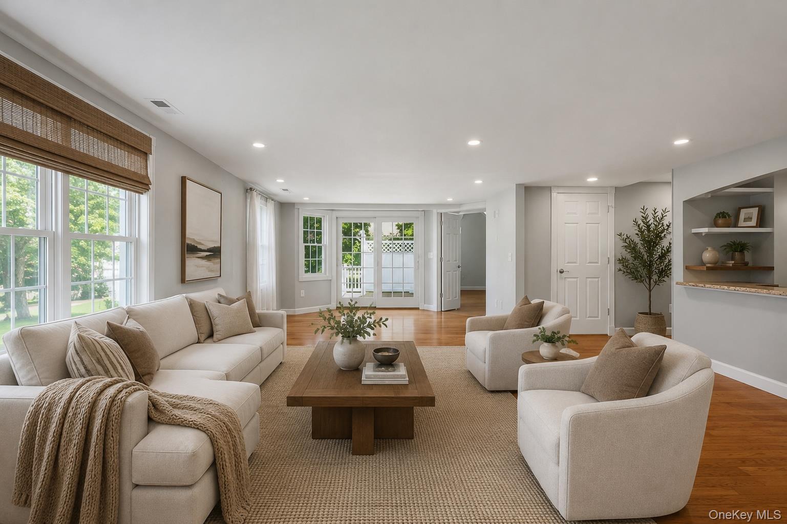 12 Leeside Road Carmel, NY 10512 - Photo 11 of 44 Spacious family room area featuring wood-finish flooring, recessed lighting, and a neutral color palette
