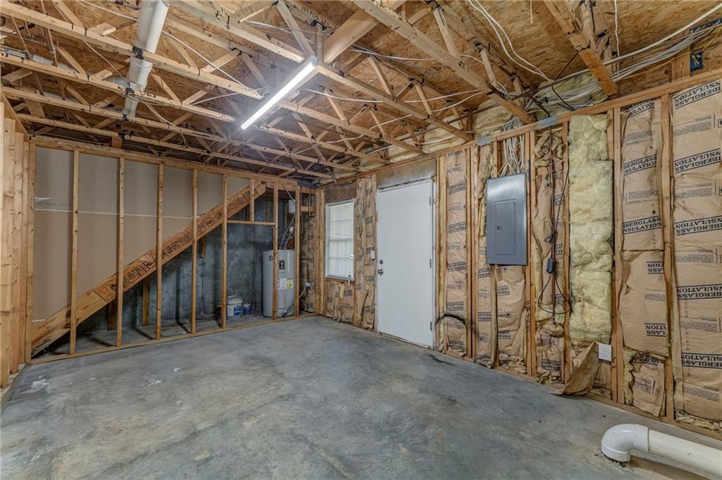 209 Enterprise Path Hiram, GA 30141 - Photo 27 of 31 a view of an empty room with wooden floor