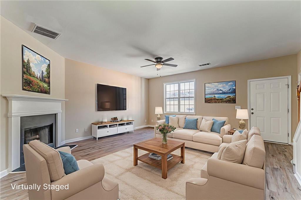 209 Enterprise Path Hiram, GA 30141 - Photo 6 of 31 a living room with furniture and a fireplace